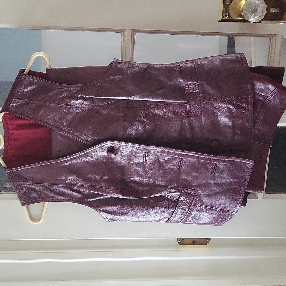 Leather outfit ( pants and vest) It is vintage/ circa late 70's